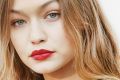 Gigi Hadid sporting on trend red lips at the Giambattista Valli.