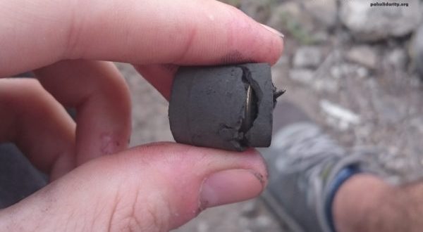 Partially ruptured rubber-coated steel bullet found in the dirt at Kafr Qaddum. ISM