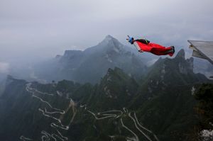 ZHANGJIAJIE, CHINA - OCTOBER 13: Wingsuit flyer Gabriel Lott of Brazil jumps off a mountain during the 5th World ...