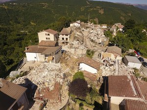 Aerial view of the village of Saletta in central Italy, Friday, Aug. 26, 2016, where a strong quake hit early Wednesday. Strong aftershocks rattled residents and rescue crews alike Friday as hopes began to dim that firefighters would find any more survivors