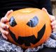 Australians are warming to Halloween with the price of carving pumpkins having fallen from $30 per kilogram to $3.