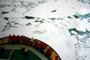 An icebreaker in the Ross Sea. To pass through ice-covered water, an icebreaker uses its great momentum and power to drive its bow up onto the ice, breaking the ice under the immense weight of the ship.