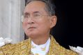 Thailand's King Bhumibol Adulyadej acknowledges the crowd in Bangkok during the celebrations of the 60th anniversary of ...