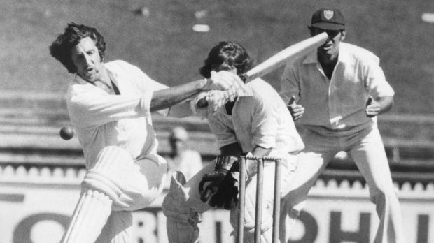 Victorian cricketer Max Walker attempts to sweep New South Wales bowler David Hourn during a Sheffield Shield match at the Sydney Cricket Ground, 17 February 1976. 