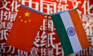 The national flags of India (R) and China are seen at the Delhi World Book fair at Pragati Maidan in New Delhi on January 9, 2016.   AFP PHOTO / CHANDAN KHANNA / AFP PHOTO / Chandan Khanna