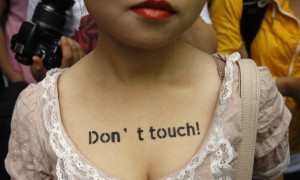 A woman takes part in a 'SlutWalk' protest in Seoul. Photo: Reuters / Truth Leem