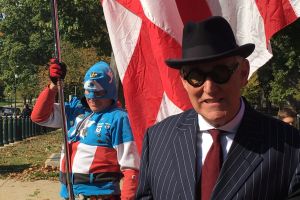 Roger Stone at a pro-Trump protest in Washington, DC, with "Captain America". 