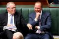 Treasurer Scott Morrison and Minister for Immigration and Border Protection Peter Dutton during question time at ...