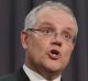 Treasurer Scott Morrison and Minister for Revenue and Financial Services Kelly O'Dwyer address the media during a press ...