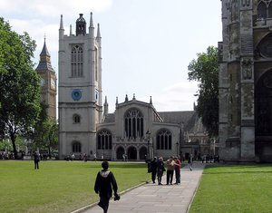 St. Margaret’s Church, Westminster, London, England. To the left is the Clock Tower of Big Ben, to the right is a corner of Westminster Abbey.