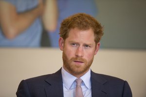 Britain's Prince Harry takes part in a round table discussion with HIV doctors at King's College Hospital in south London, Thursday, July 7, 2016, as part of his desire to learn more and raise public awareness in the fight against HIV and AIDS