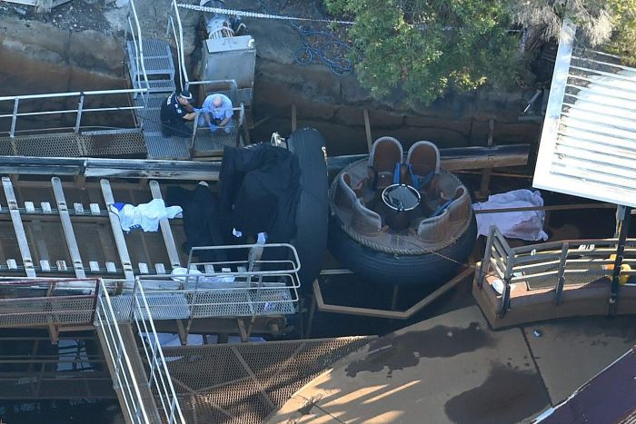 Queensland Emergency service personnel are seen at Thunder River Rapids ride.