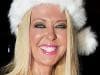 Tara Reid shows some skin in a skimpy Santa outfit