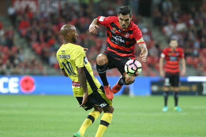 Dimas Delgado leaps in air with ball