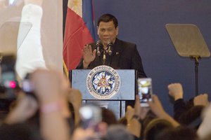 Philippine President Rodrigo Duterte  address members of the Philippine community in Beijing, China, Wednesday, Oct. 19, 2016.