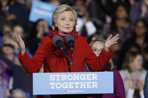 Democratic presidential candidate Hillary Clinton campaigns at the base of the John A. Roebling Suspension Bridge in Cincinnati, Monday, Oct. 31, 2016.