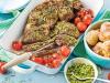 Butterflied lamb with macadamia and spinach pesto