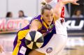 Melbourne Boomersâ guard Maddie Garrick is fouled by Adelaide's Kayla Standish. 