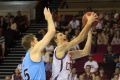 Brisbane reserve guard Matt Kenyon attacks the basket against New Zealand.