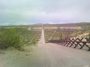 U.S./Mexico border, with vehicle barrier, in New Mexico and Chihuahua near International Boundary Monument number 9.