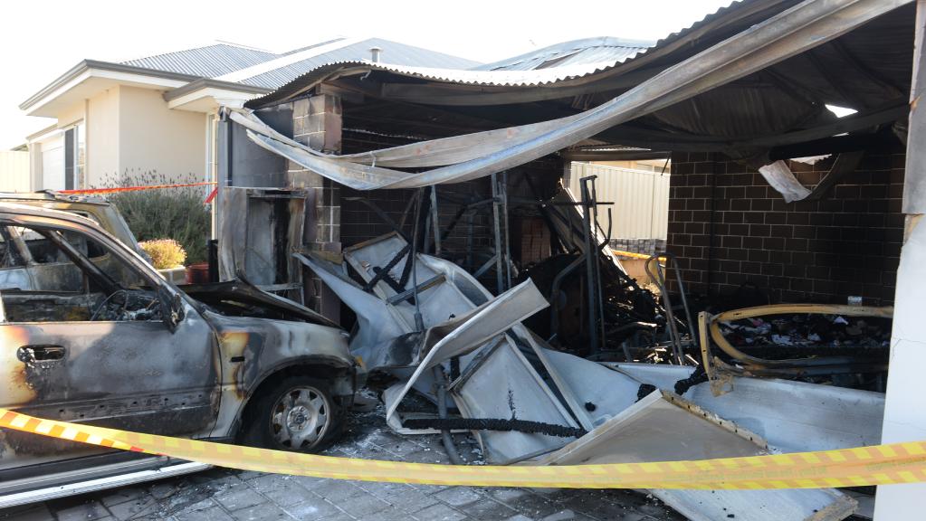 A Baldivis house fire has destroyed two vehicles and left an estimated &#36;350,000 damage bill after a fire started in a garage. Picture: Justin Benson-Cooper