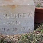 Headstone of Jim Brew, a striking miner who was shot and killed after he shot and killed a Citizen's Protective League member who attempted to round him up for deportation