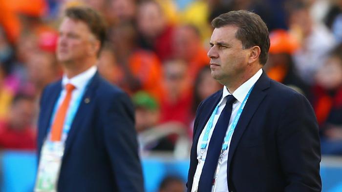 PORTO ALEGRE, BRAZIL - JUNE 18: Head coach Ange Postecoglou of Australia (R) and head coach Louis van Gaal of the Netherlands look on during the 2014 FIFA World Cup Brazil Group B match between Australia and Netherlands at Estadio Beira-Rio on June 18, 2014 in Porto Alegre, Brazil. (Photo by Cameron Spencer/Getty Images)