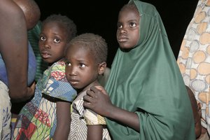 File - Children rescued by Nigeria soldiers from captivity from Islamist extremist group Boko Haram at Sambisa forest arrive at a camp in Yola, Nigeria, Saturday May. 2, 2015.