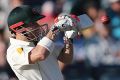 Australia's David Warner plays a shot on the first day of play in Perth on Thursday.