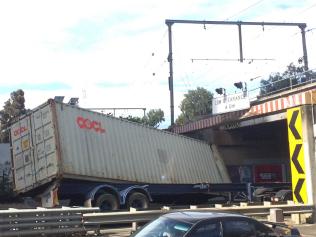 Truck crashes into overpass in Napier St, Footscray.