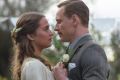 Michael Fassbender stars as Tom Sherbourne and Alicia Vikander as his wife Isabel in <i>The Light Between Oceans</i>, ...