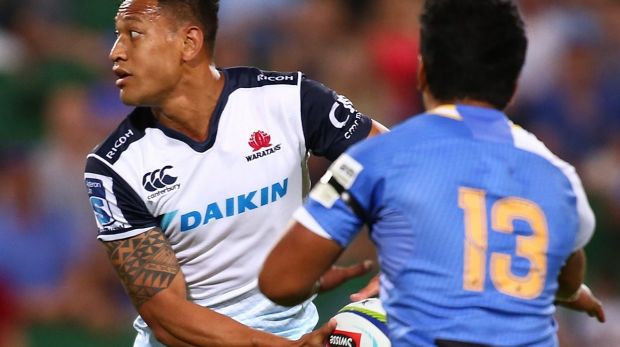 Record-breaker: Israel Folau  looks to pass.