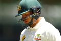 Single paper and online use ONLY. Fee applies. PERTH, AUSTRALIA - NOVEMBER 07: Usman Khawaja of Australia looks dejected ...