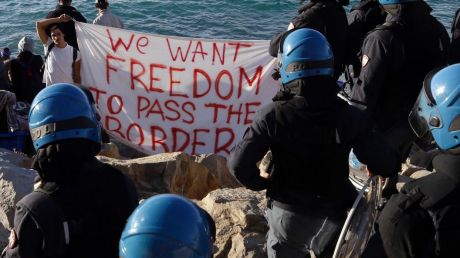 Migrants ask to pass through Italy. Amnesty International says Italian police have beaten and abused some migrants.