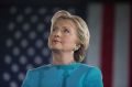 Hillary Clinton, 2016 Democratic presidential nominee, listens on stage during a campaign rally in Manchester, New Hampshire.