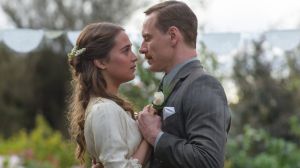 Michael Fassbender stars as Tom Sherbourne and Alicia Vikander as his wife Isabel in <i>The Light Between Oceans</i>, ...