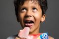 Eight-year-old Luca Portwin tucks into a Paddle Pop. 