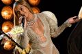 Beyonce wears a J'Aton dress as she performs with the Dixie Chicks at the Country Music Awards in Nashville on Wednesday.
