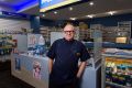 Solly Lew at his chemist in St Kilda. Chemist Warehouse has moved in next door. 