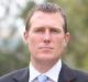 Christian Porter announced a national scheme to compensate victims of child sexual abuse but a clause in the scheme ...