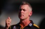 PERTH, AUSTRALIA - MARCH 13: Eagles head coach Adam Simpson speaks to his players during the NAB Challenge AFL match ...