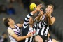 MELBOURNE, AUSTRALIA - JUNE 24:   Travis Cloke of the Magpies and Jesse White of the Magpies compete for the ball with ...