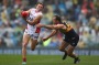 PERTH, AUSTRALIA - JULY 23: Jayden Hunt of the Demons handballs against Shannon Hurn of the Eagles during the round 18 ...