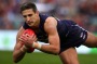 PERTH, AUSTRALIA - AUGUST 28: Matthew Pavlich of the Dockers marks the ball against Fletcher Roberts of the Bulldogs ...