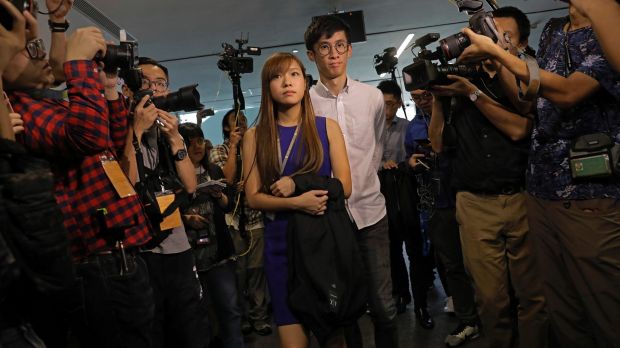 Yau Wai-ching and Sixtus Leung outside the legislature council in Hong Kong. 