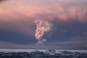 In this photo taken on Saturday, May 21, 2011, smoke plumes from the Grimsvotn volcano, which lies under the Vatnajokull glacier, about 120 miles, (200 kilometers) east of the capital, Rejkjavik, which began erupting Saturday for the first time since 2004.