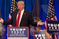 Republican presidential candidate Donald Trump acknowledges supporters during a campaign rally, Friday, Nov. 4, 2016, in ...