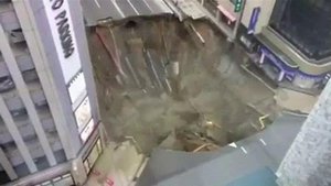 Giant sinkhole swallows Japan city street