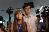 Yau Wai-ching and Sixtus Leung face the media. Beijing has moved to bar them from office.