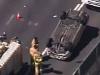 Car flip gridlocks two freeways